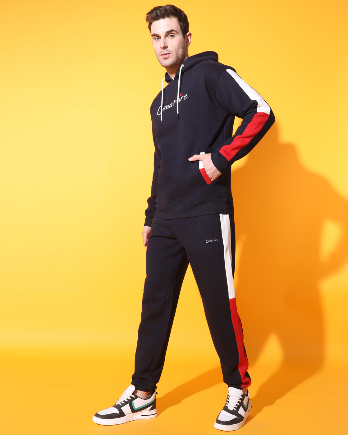 Dynamic Navy Track Suit: Bold Red and White Panel Design for Unisex Style