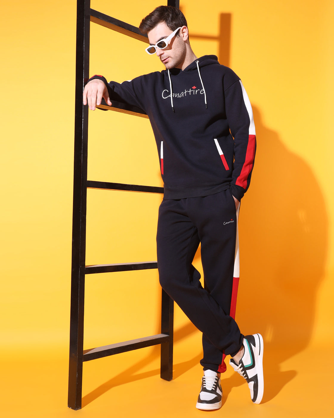 Dynamic Navy Track Suit: Bold Red and White Panel Design for Unisex Style